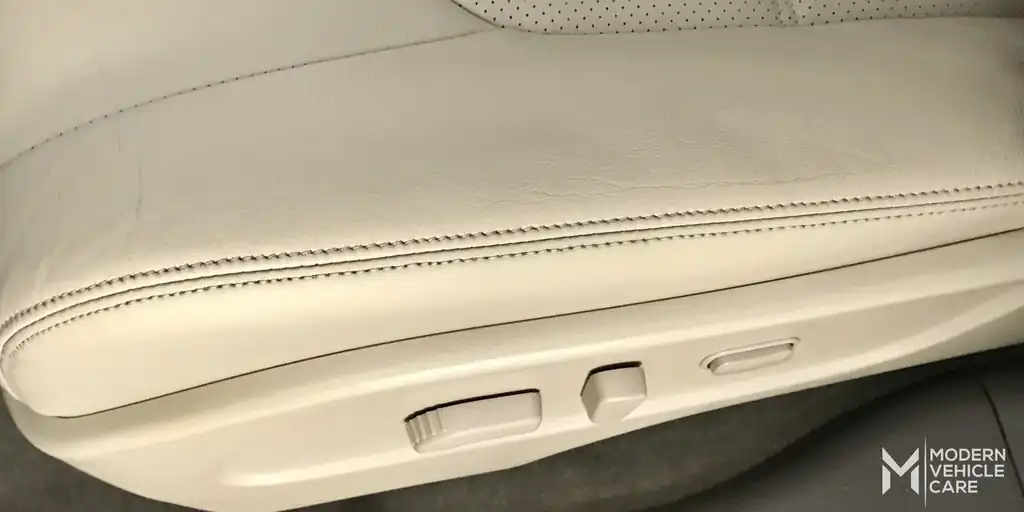 The same leather seat bolster restored